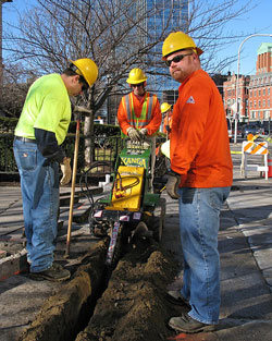 Typical fiber optic cable installation underway.